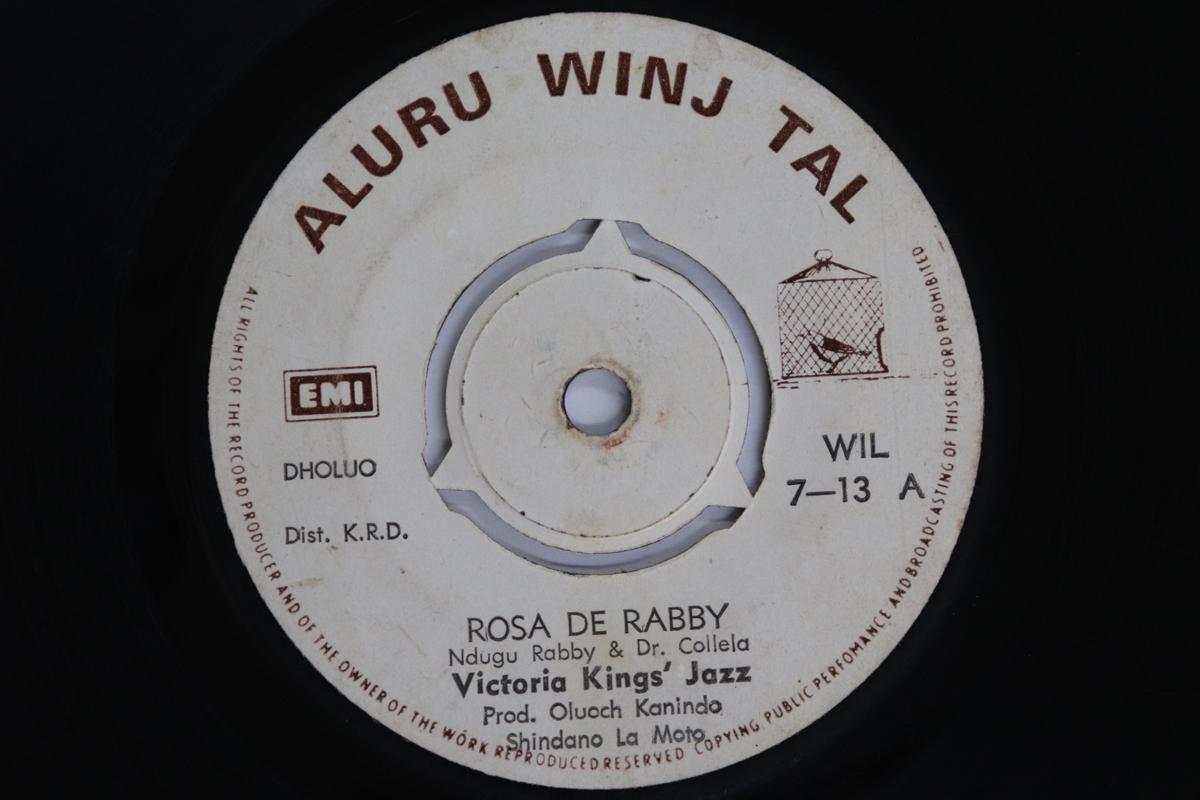 

7-дюймовая пластинка VICTORIA KINGS JAZZ - Rose De Rabby / Penina WIL713 ALURU WINJ TAL Kenya Мировая музыка Б/У