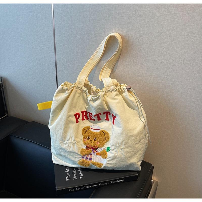 The new School of Arts and Art style is simple and large-capacity tote bag, and women's tide is popular. Versatile commuter shoulder bag.