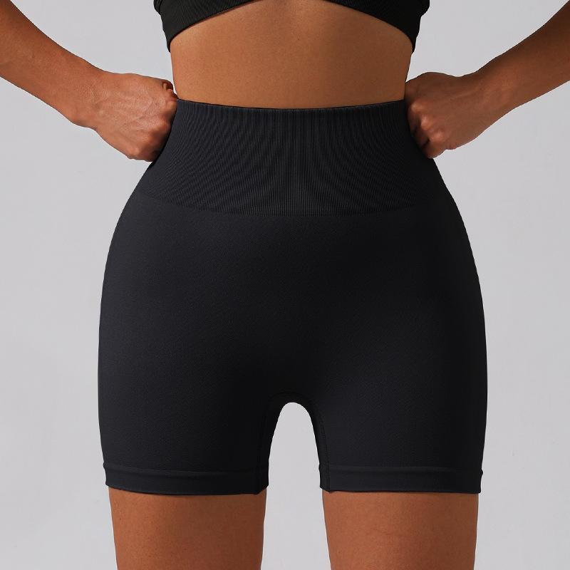 

Sports shorts European and American peach hip lift abdomen high waist solid color yoga pants sports running fitness three-point pants S чорний