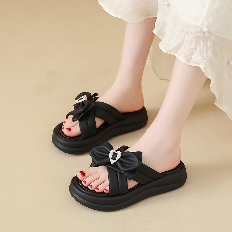 Stepping on shit slippers fairy style women's models 2025 summer new models wear thick-bottomed bows with skirts cool slippers