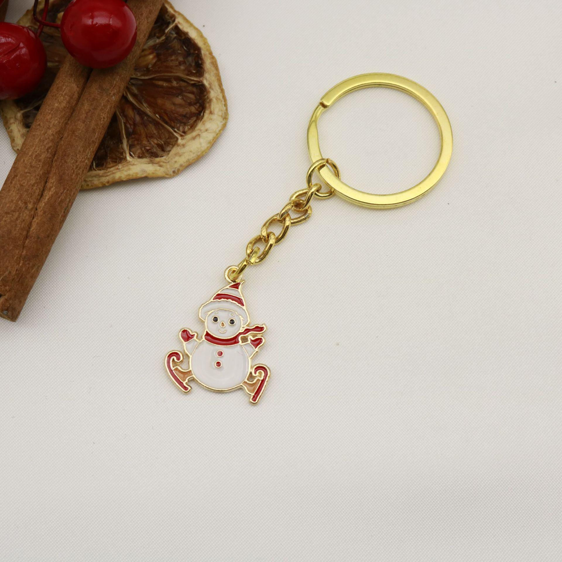 European & American Cartoon Christmas Snowman Tree Keychain with Cute Sled Pendant золотой