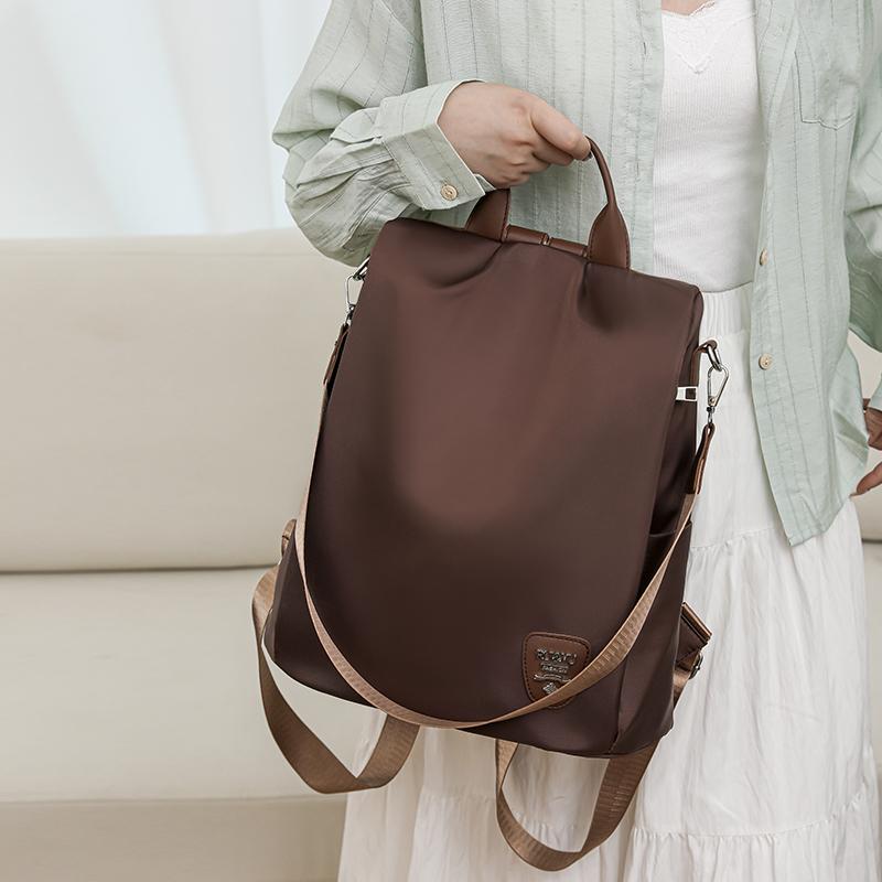 Diebstahlsicherer Rucksack Damen-Rucksack aus Nylongewebe mit großer Kapazität, leichte Umhängetasche