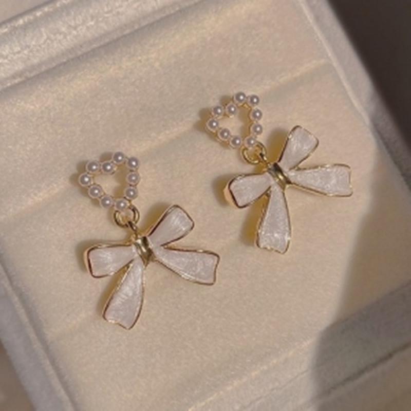 Korean Unique Pearl Bow Earrings for Women 2024 - Stylish, Versatile, and Elegant Stud Jewelry