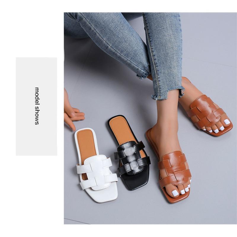 Große Damenschuhe, flache Hausschuhe, Hausschuhe für den Alltag mit gewebten Riemen, flache Hausschuhe aus Gummi mit einem Riemen und flachem Absatz