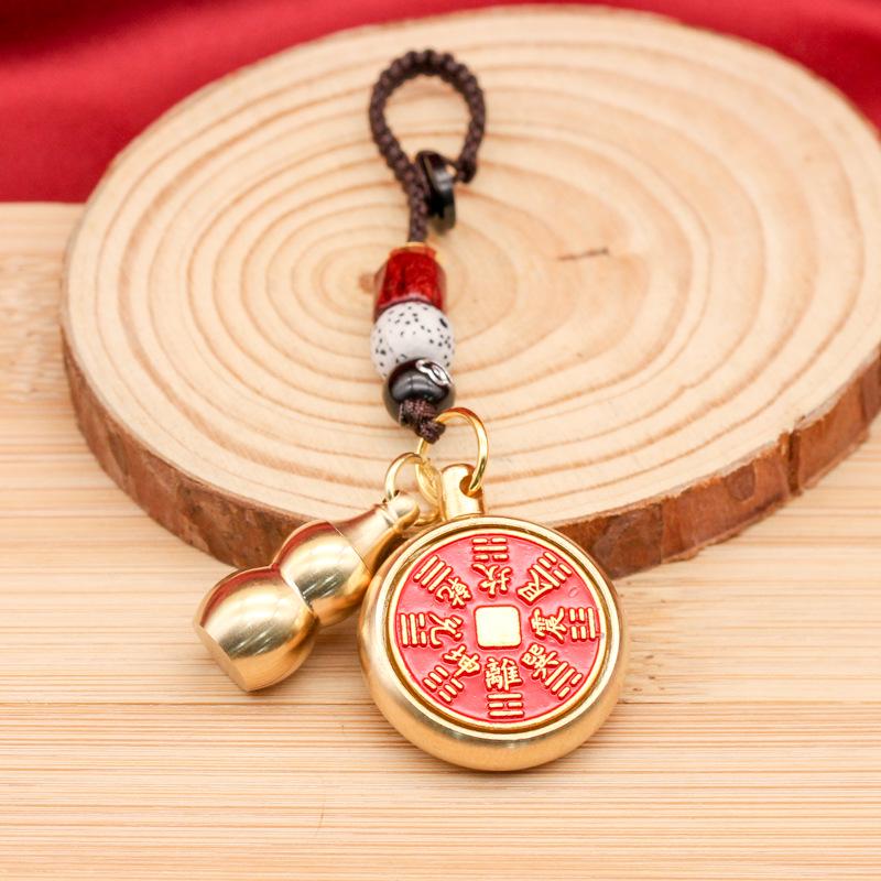 

Rotating Brass Cinnabar Ghost Money Keychain Pendant - Dragon Year Gift