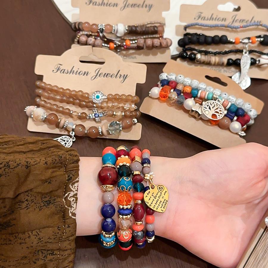 Glass Coconut Shell Beaded Wing Pendant Bracelet: Trendy, Luxurious, Versatile Jewelry for Women