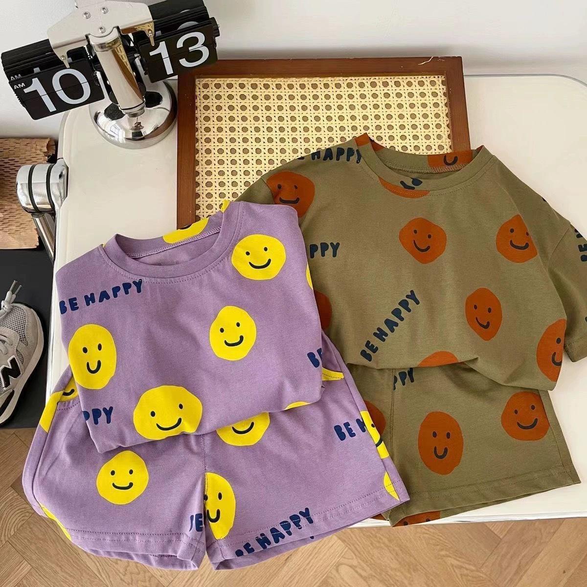 

Летний костюм-двойка с короткими рукавами и рисунком смайлика для девочек и мальчиков - коллекция 2023 г. 140 cm
