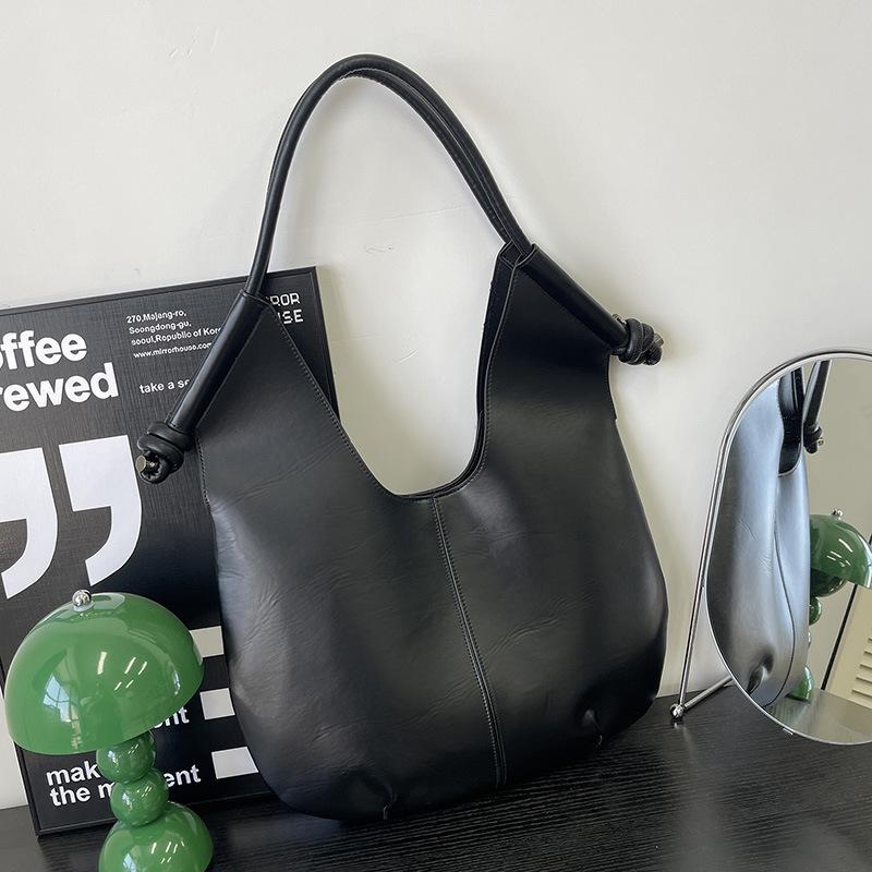 

Сумка-тоут премиум-класса в нишевом минималистичном стиле, женская, весенняя новинка, большой вместимости, для通勤, универсальная, на плечо, подмышку чёрный