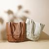New niche woven cowhide tote bag fashionable hollow handbag large capacity new casual shoulder armpit bag