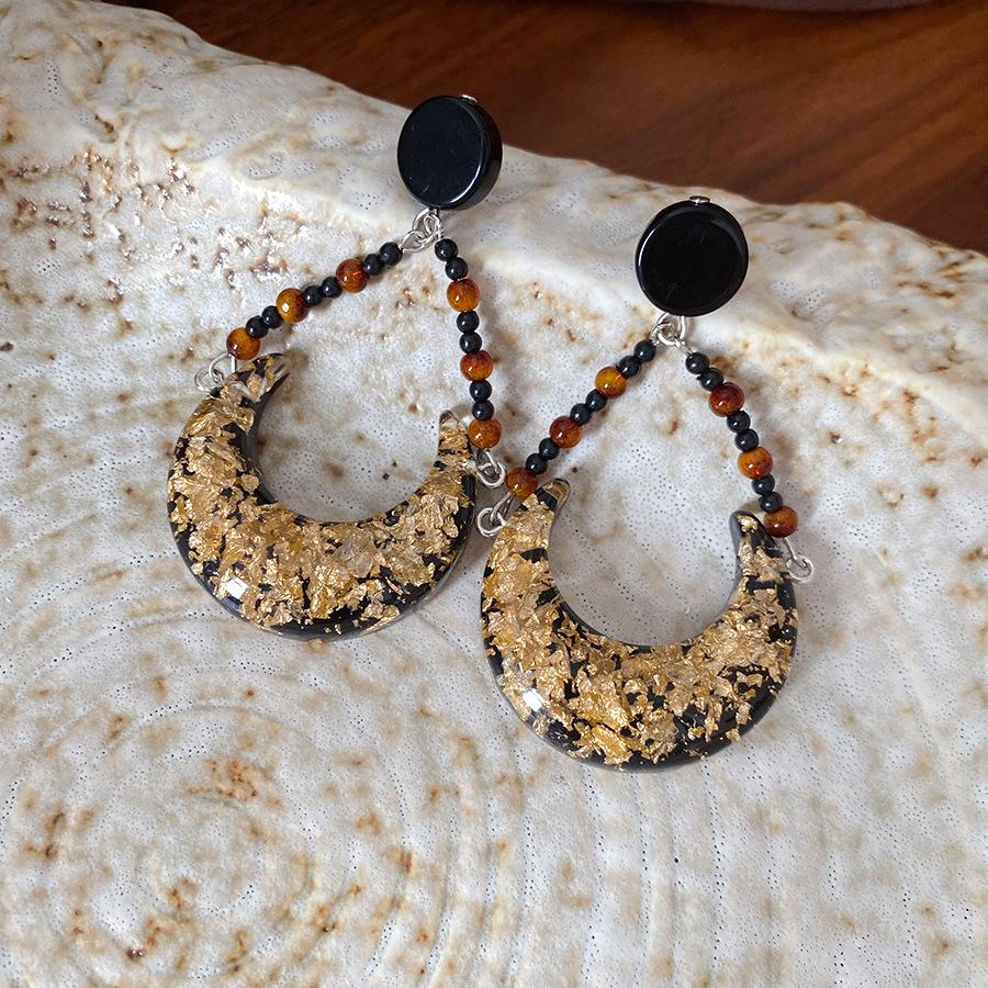 

Silver needle resin gold foil moon earrings light luxury high-end stud earrings retro exaggerated personalized earrings design sense niche