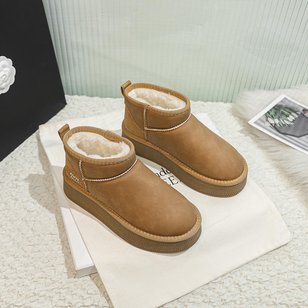 

Cowhide version of grape mother with the same sweetheart muse~ warm huhu thick-soled round head leather surface short snow boots women thickened 40 малиновий