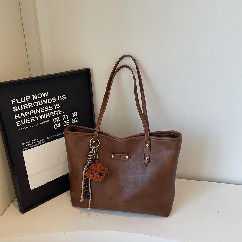 

Tote bag women s shoulder large bag portable fashion 2025 autumn new large-capacity commuter bag student shoulder bag коричневый