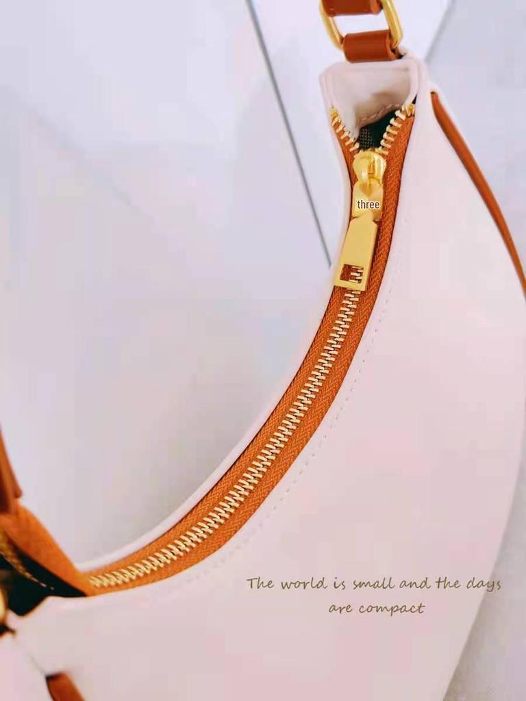 2025 Halbmondförmige Damen High-End Mode Schultertasche