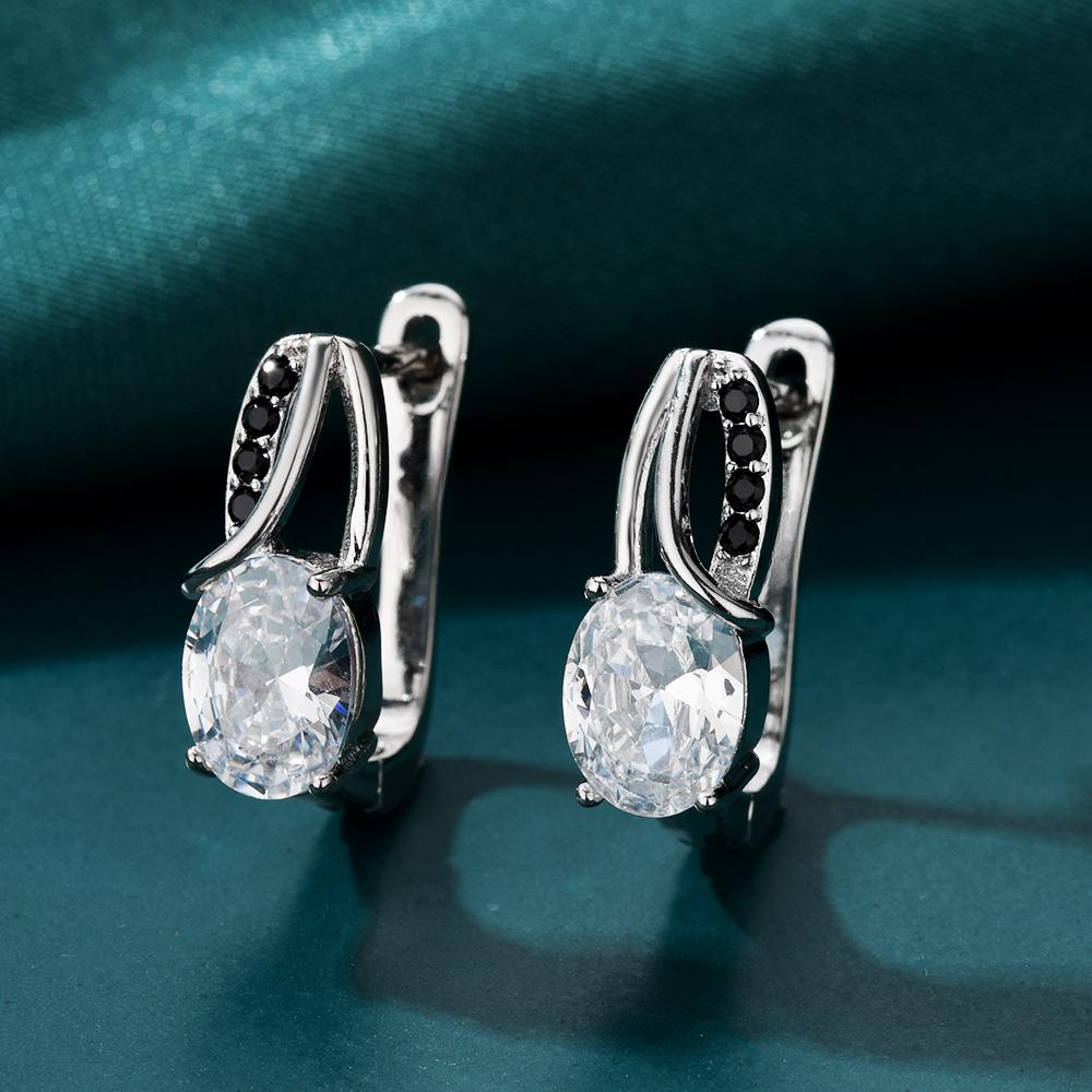 Black Awn Creolen mit weißem Zirkon und schwarzem Stein