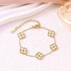 European Three-Piece Jewelry Set: Retro Black Gold Four-Leaf Clover Necklace, Earrings, and Bracelet