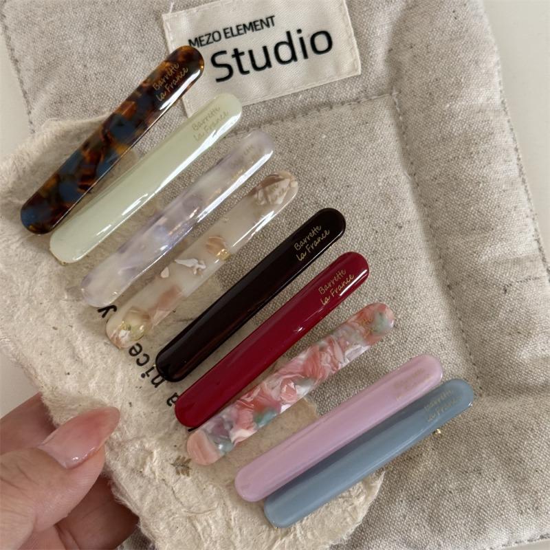 Korean version of the gold label cute little baguette one-word clip French acetic acid texture solid side bangs clip