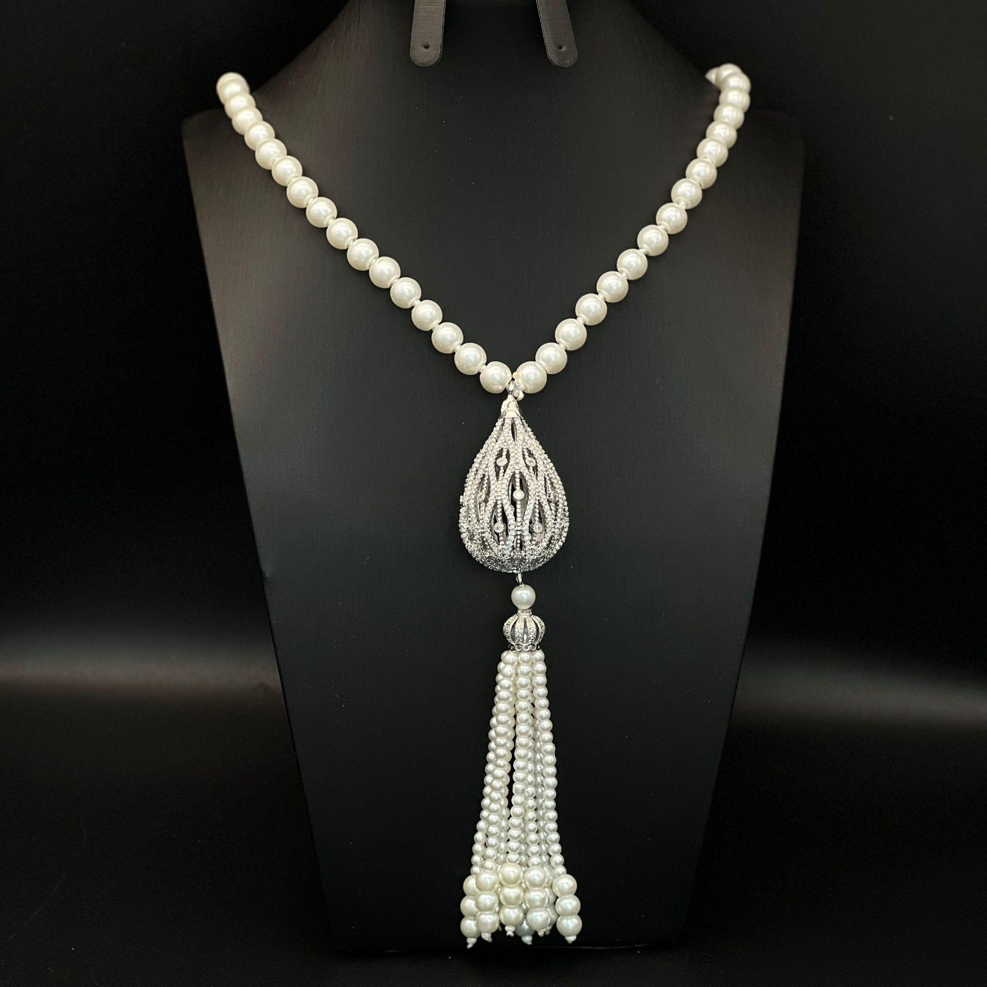 Elegant European & American Light Luxury Tassel Pearl Sweater Chain with 3D Hollow Zircon Pendant