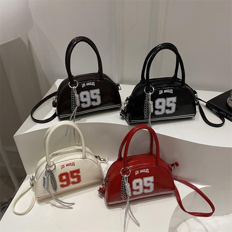 Bag women's new bowling bag fashionable oily leather splicing contrasting color digital decoration portable women's handbag