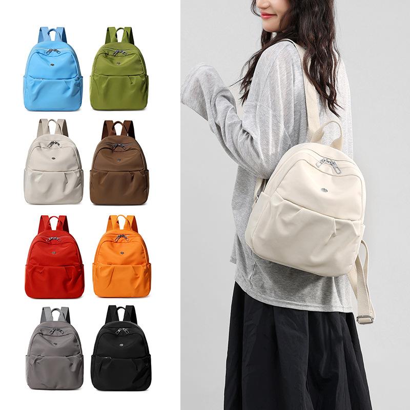 

Женский легкий рюкзак Водоотталкивающий рюкзак Студенческий нейлоновый школьный рюкзак бежевый