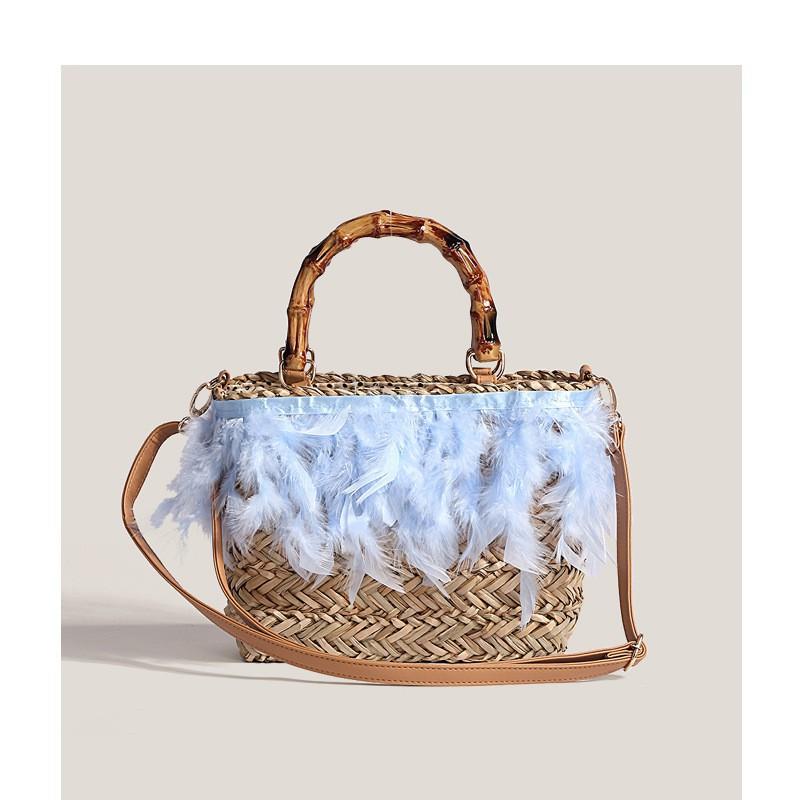 

Seaside Vacation Beach Woven Bag Women 2025 New Single-shoulder Cross-slung Feather Straw Bamboo Tote синій