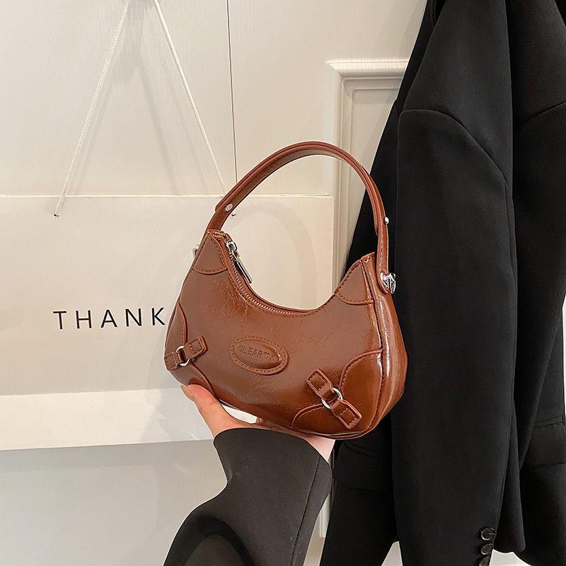 

French niche underarm bag new fashion retro single fashion shoulder commuter premium messenger saddle bag коричневий