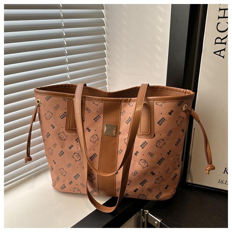 

Вместительная сумка для поездок на работу, женская, новая коллекция 2025 года, модная сумка-тоут с принтом, универсальная повседневная сумочка, сумка через плечо коричневый