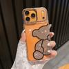 Applicable to iphone17ProMax mobile phone case with diamond bear Apple 16 rhinestone acrylic 15 cartoon protective case