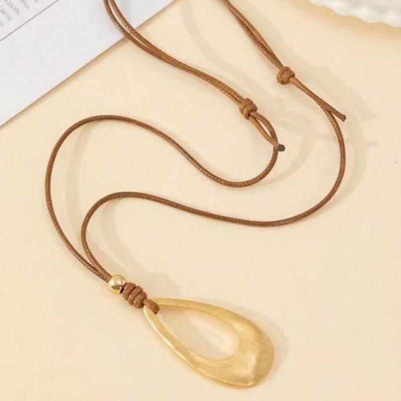 Female Necklace Retrostyle With Hollow Droplet Shape And Titanium Steel Detail