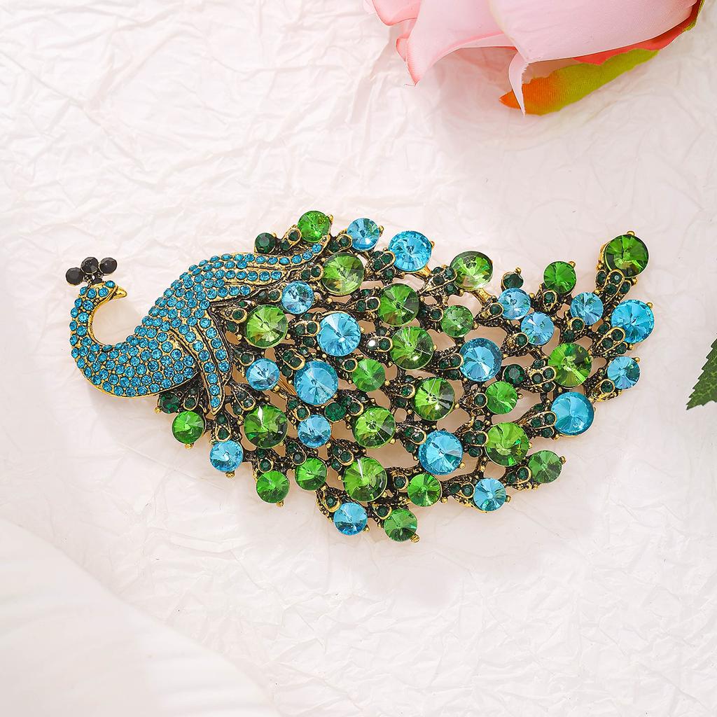 Luxurious Peacock Brooch for Women - Retro Animal Decorated Fixed Pin