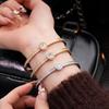 Stainless Steel Zircon Round Buckle Bangle: Luxury Fashion Bracelet for Versatile Wear.