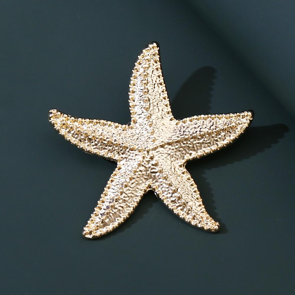 Retro French Alloy Starfish Brooch European and American Light Luxury Simple Gold Textured Ocean Series Corsage 2026
