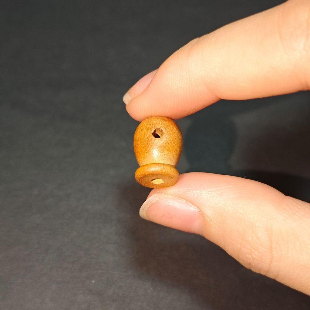 Mindful Peach Wood Fish Beads Bracelet with Carved Wooden Pendant