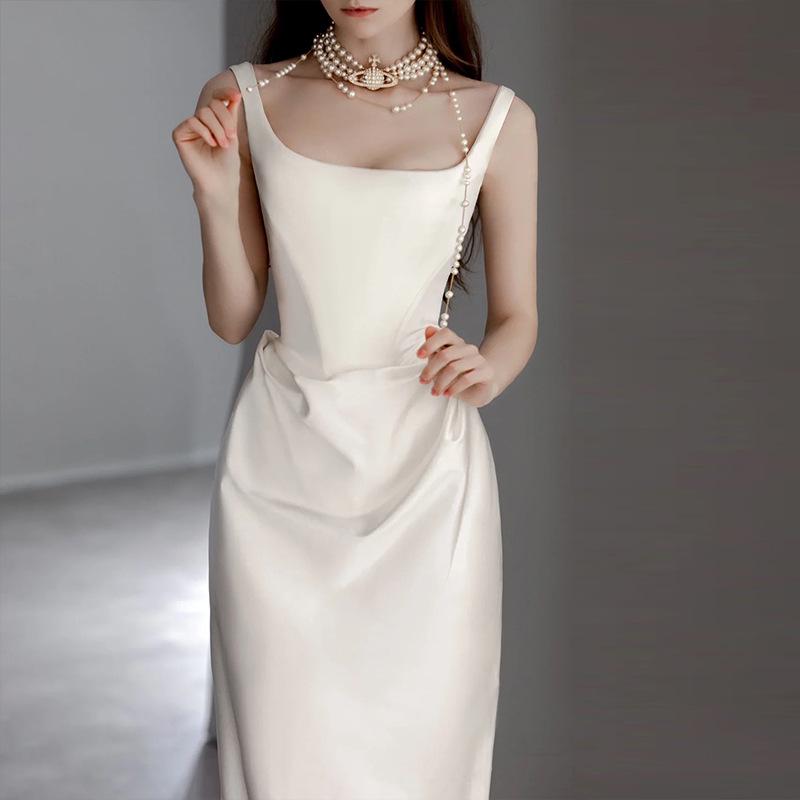 Retro Satin Light Wedding Dress - Simple Spaghetti Strap Gown with Small Train