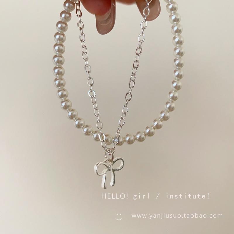 

Изысканный двухслойный нежный французский браслет с бантом и жемчугом - Высококлассные штабелируемые украшения для женщин