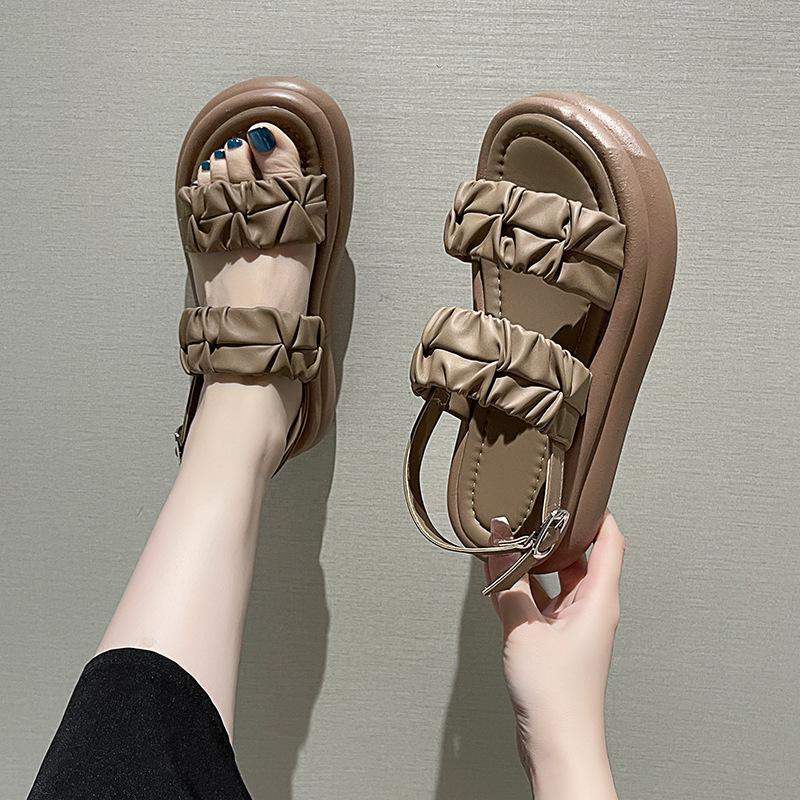 

In the summer of 2024, the new Xiaoxiangfeng platform women s sandals, muffin and cloud one-word buckle strap Roman shoes 40 темно-коричневого кольору