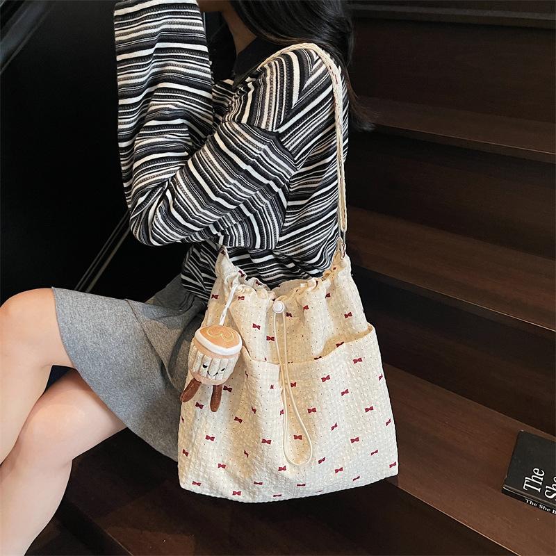 Striped canvas bag women's large capacity summer versatile shoulder messenger bag drawstring premium sense bucket bag