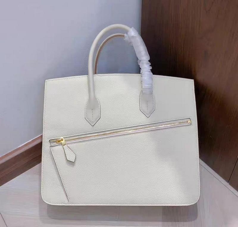 New genuine leather women's bag top layer cowhide 30CM irregular diagonal hijab Desordre handbag