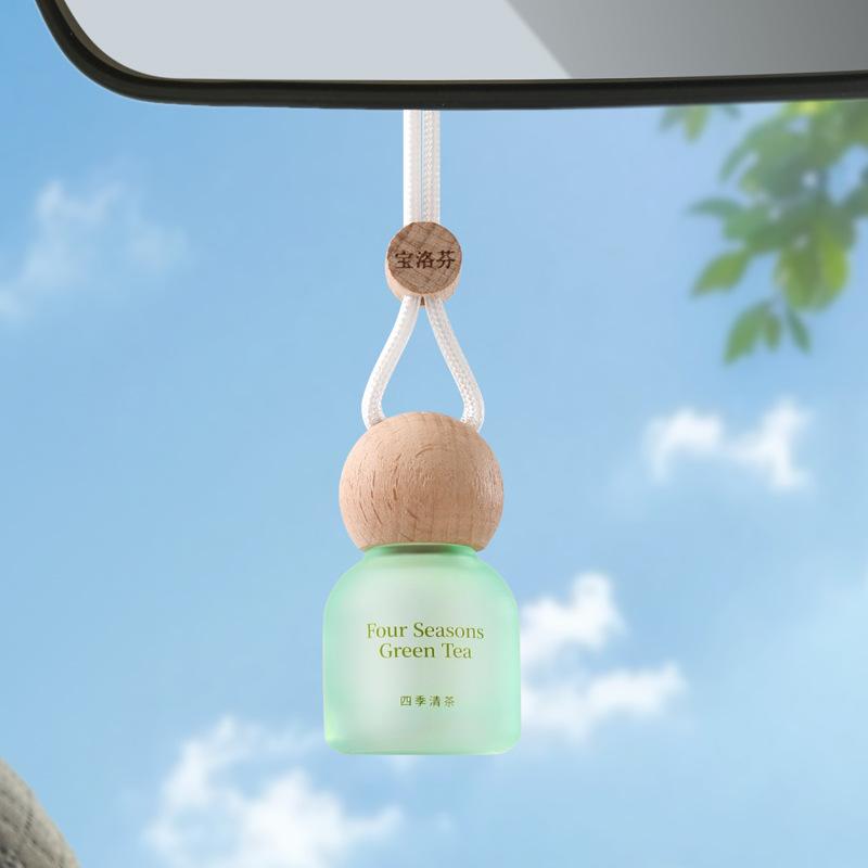 

Elegant Hanging Car Perfume Diffuser – Wooden Cap Aroma Pendant for Car and Home