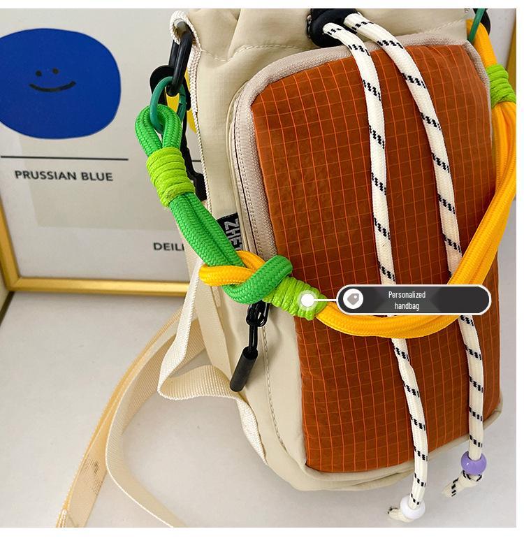 Women's Nylon Color Block One-Shoulder Crossbody Bag with Woven Lanyard, Lightweight and Stylish.