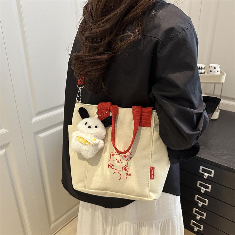 Korean Contrasting Color Portable Canvas Bag Women's 2025 New Casual Versatile Messenger Bag Popular Commuter Bag
