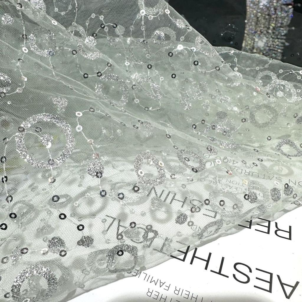 Embroidered sequin round patchwork net fabric suitable for wedding dresses formal gowns and designer clothing fabrics
