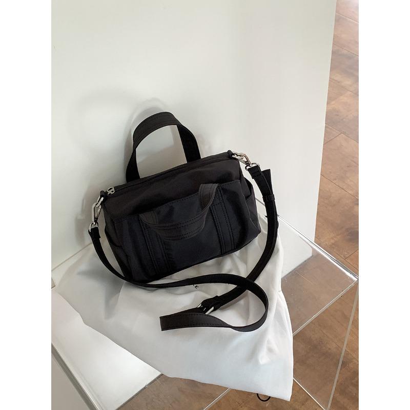 

Niche nylon bucket bag simple new casual messenger small bag versatile hand bag чёрный