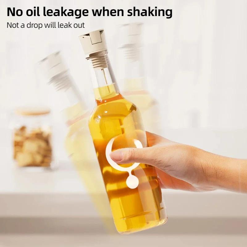 Zátka na láhev s olejem, víčko z potravinářského plastu, gravitační senzor, koření, nalévání oleje, tryska, nepropustná zátka, dávkovač alkoholu, kuchyňské nářadí