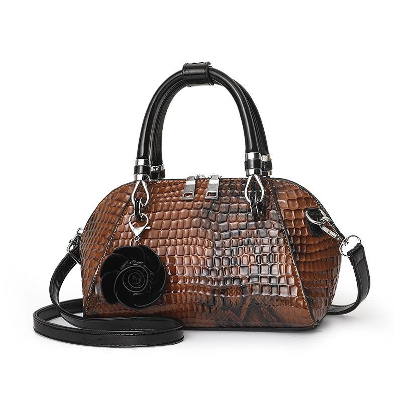 Eine neue Schlangenleder-Muster einfache Crossbody-Schultertasche große Kapazität modische PU-Damenhandtasche