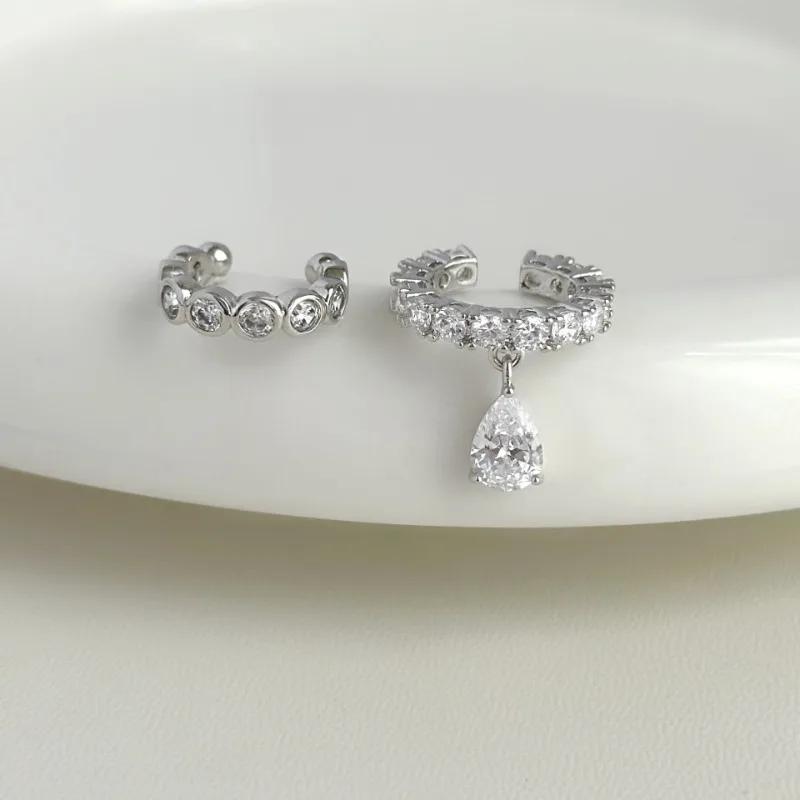 PONYKISS 925 Silber Zirkon Asymmetrische Wassertropfen Clip-Ohrringe für Damen Trendiger Feinschmuck Minimalistische Accessoires