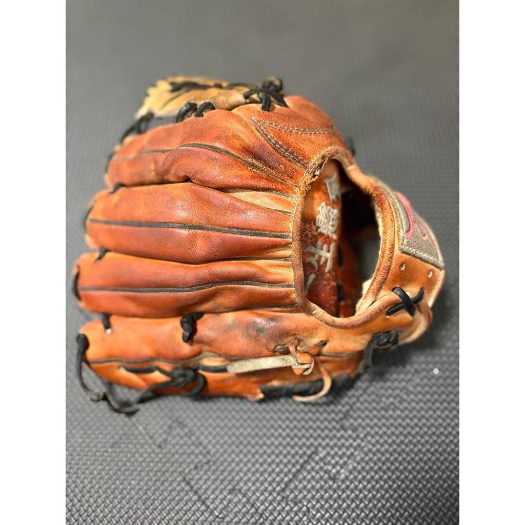 Used Kubota Slugger Hard Glove
