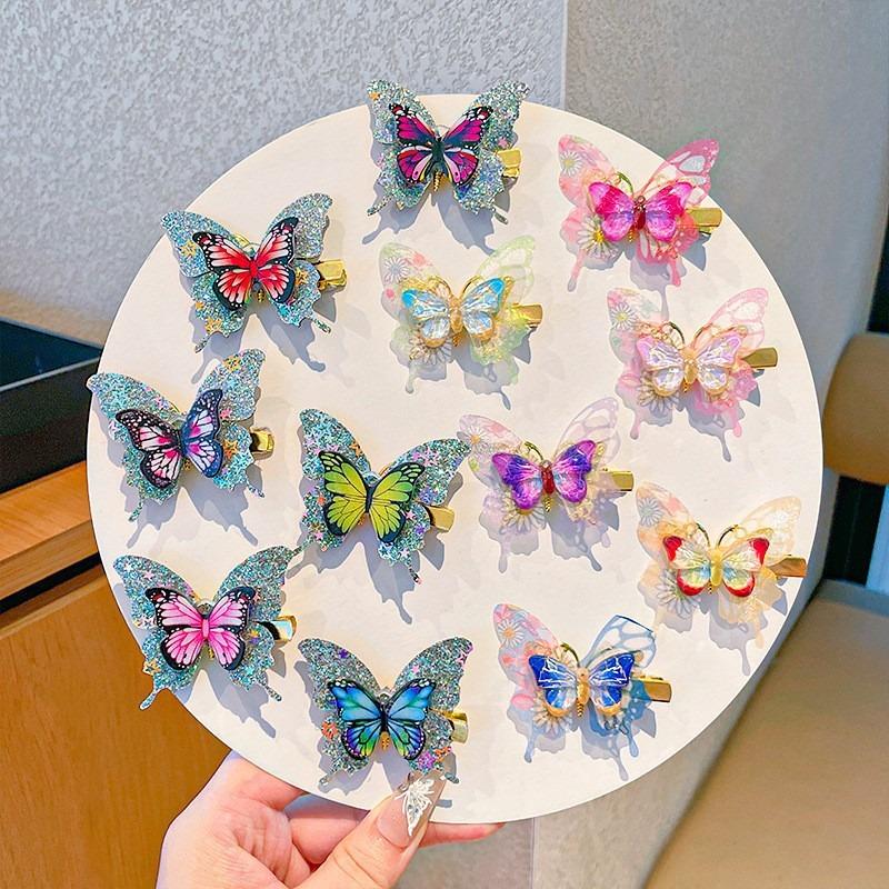 Ein Set aus sechs mehrfarbigen High-End-Schmetterlings-Haarspangen ist ein perfektes Geschenk für, um eine prinzessinnenhafte Atmosphäre zu schaffen
