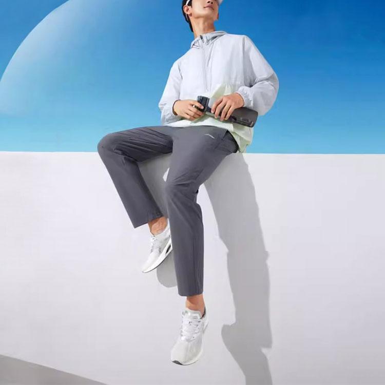 Li Ning Fitness Series Solid Color Mid Waist Comfortable Versatile Breathable Tapered Knit Sports Pants Men Pants Earth-Gray YYKU193-1