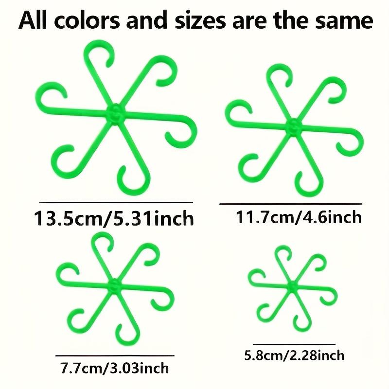 A set of four multi-functional plant support frames for plant growth, suitable for both indoor and outdoor use
