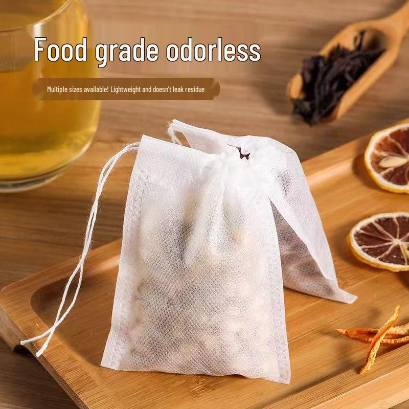 100-Piece Disposable Tea Bags: Food-Grade Non-Woven Drawstring Bags for Chinese Medicine Decoctions and Dregs Separation.